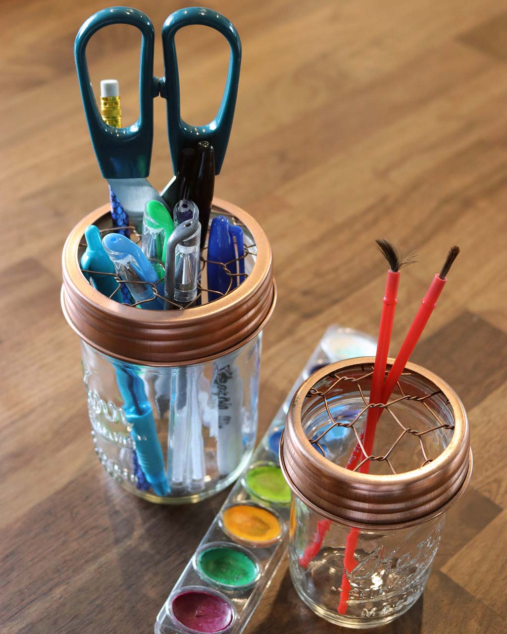 Shiny copper frog / flower / desk organizer lids for regular and wide mouth Mason jars with pens, paintbrushes, and scissors