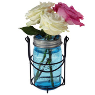 One jar caddy for hanging quart 32oz Mason jars with blue Ball jar, galvanized flower frog lid, and roses