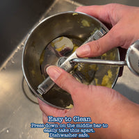 A video showing how to turn the handle on the food mill.