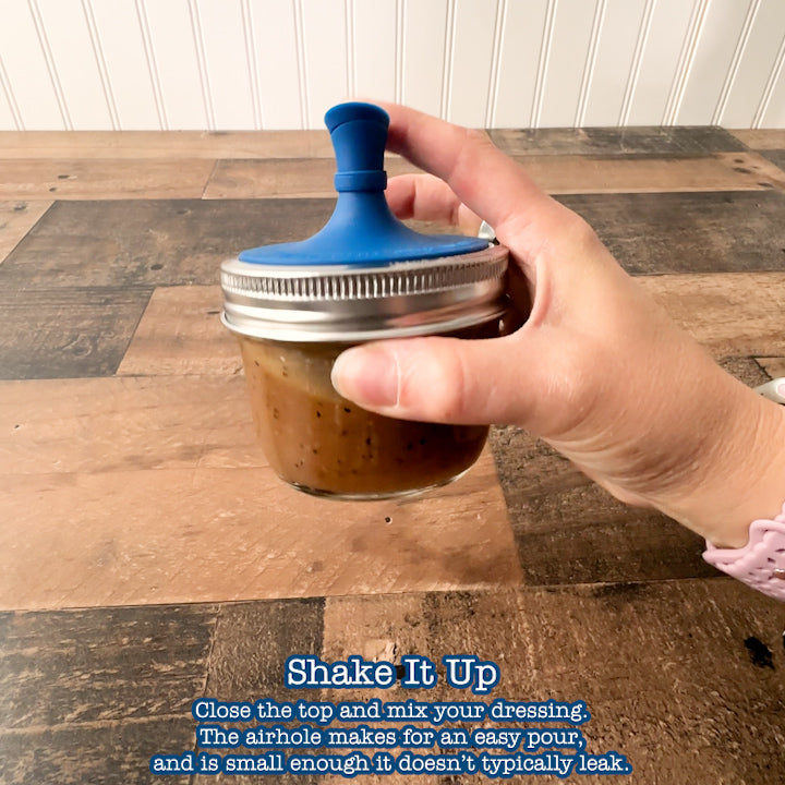 Unboxing video. You can put the top on the oil cruet and shake it with ease. The airhole included is small enough that it does not typically leak with this action. The stopper is also removeable, for easy cleaning. Everything is dishwasher safe.