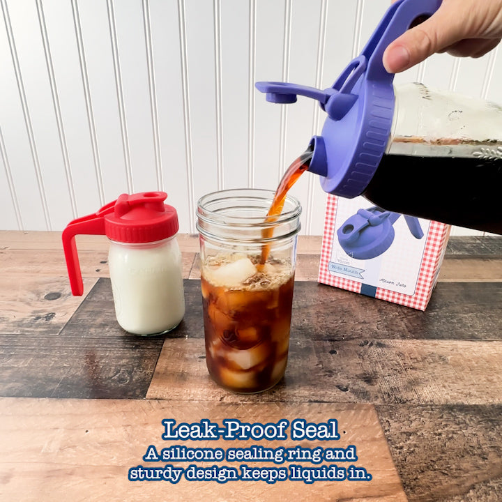 Jars turned upside down and shaken with the lids on to prove they are leak-proof.