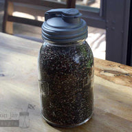 reCAP silver pour spout lid on Mason jar with smoothie seed mix