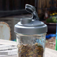 reCAP pour spout lid on wide mouth pint Ball Mason jar with pistachios