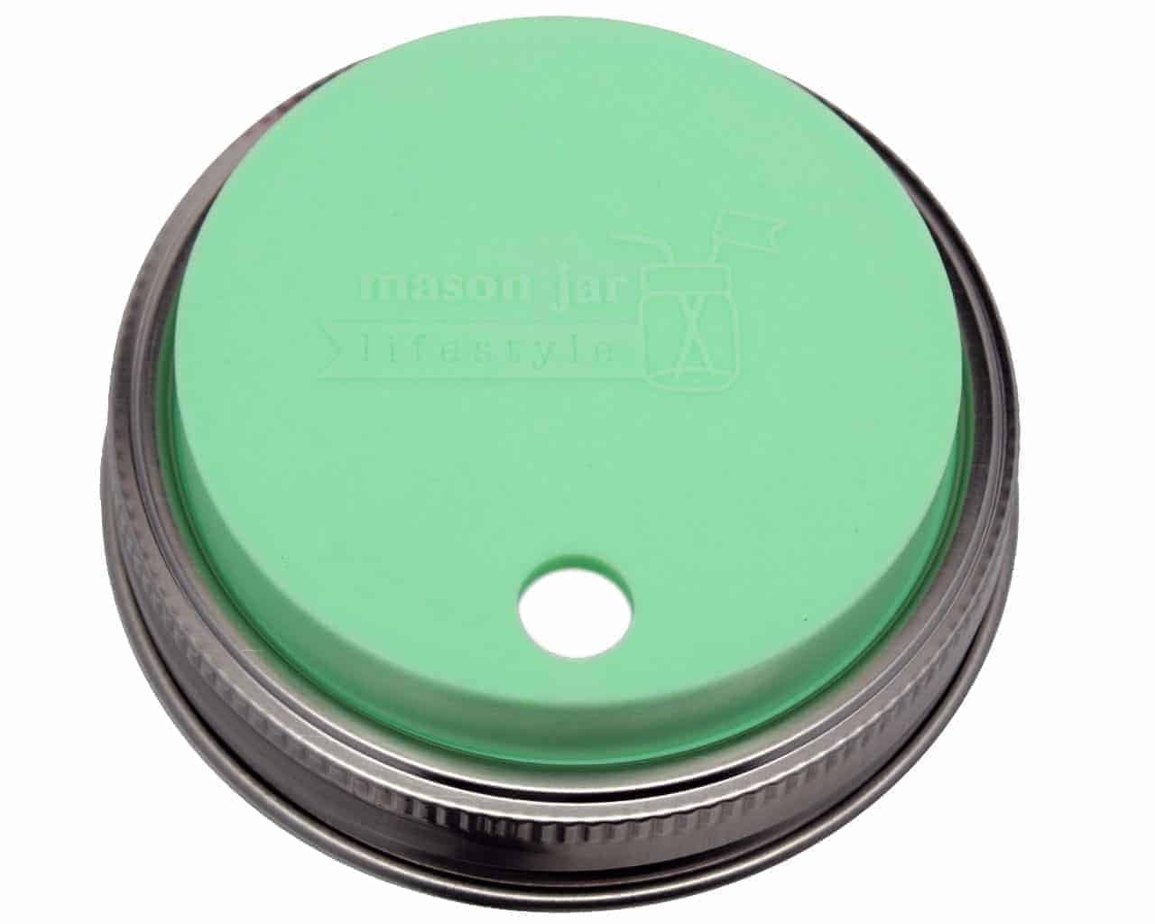 https://masonjarlifestyle.com/cdn/shop/files/silicone-straw-hole-fermenting-lid-stainless-steel-band-wide-mouth-mason-jars-mint-green.jpg?v=1695766455&width=1400