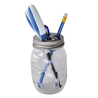 Toothbrush holder lid on regular mouth Ball pint jar with pen, pencil, and scissors