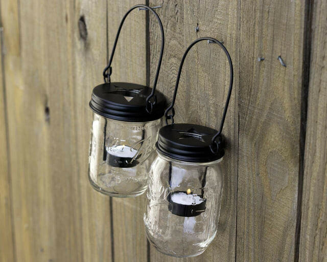 hanging mason jars on fence