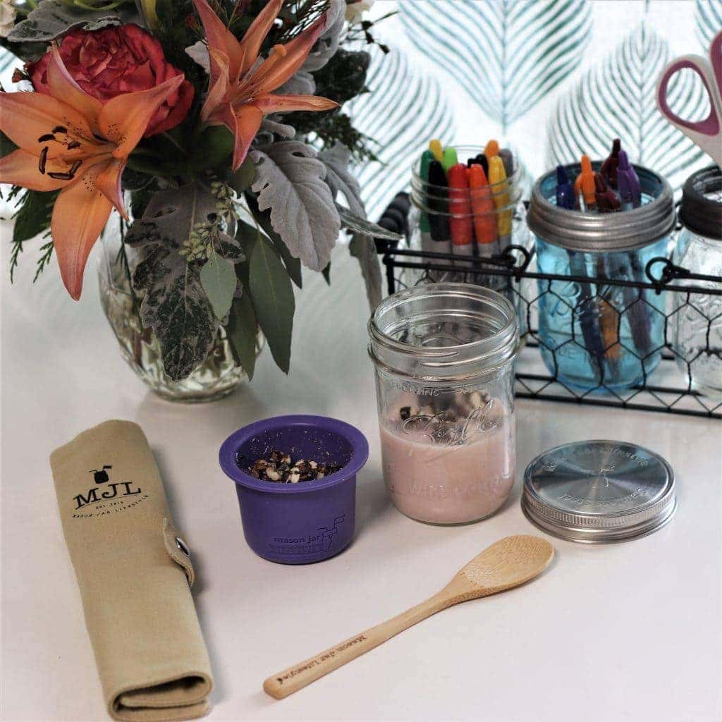 Mason Jar Lifestyle accessories showing UV purple divider cup, reusable bamboo utensils, frog lids, with caddy